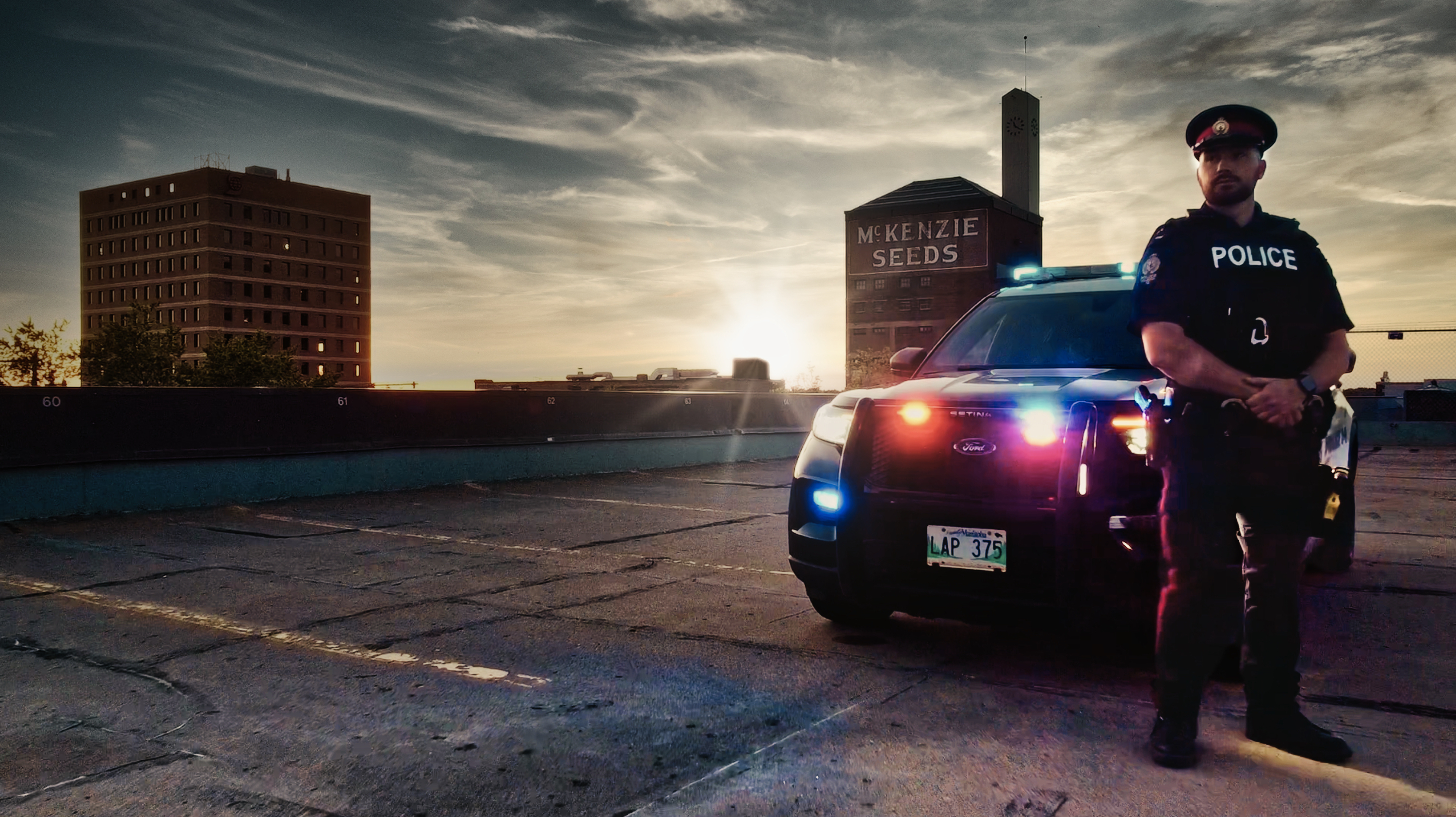 Police officer in front of a cruise with a sunset in the background