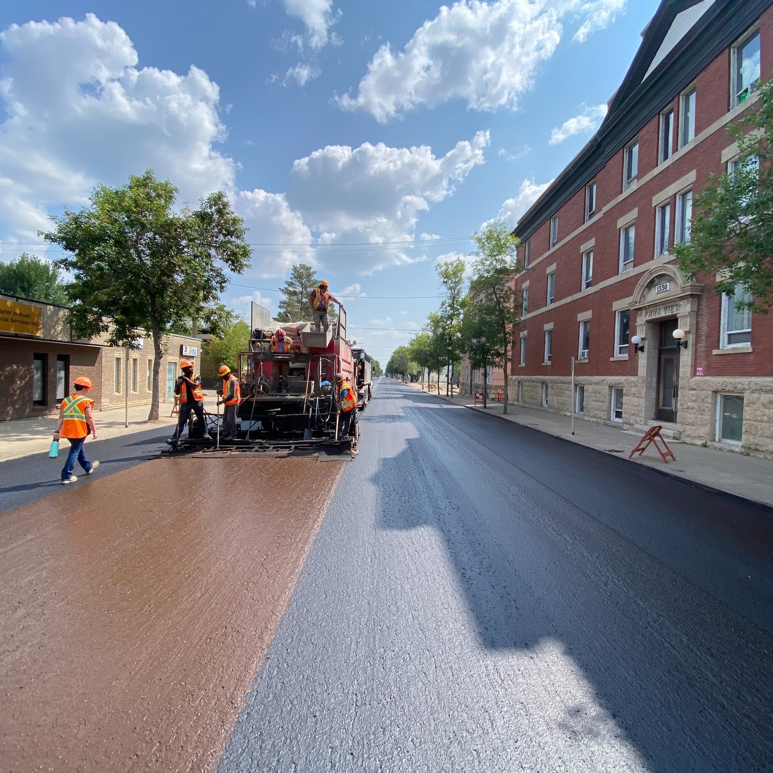 Photo of micro surfacing work being done.
